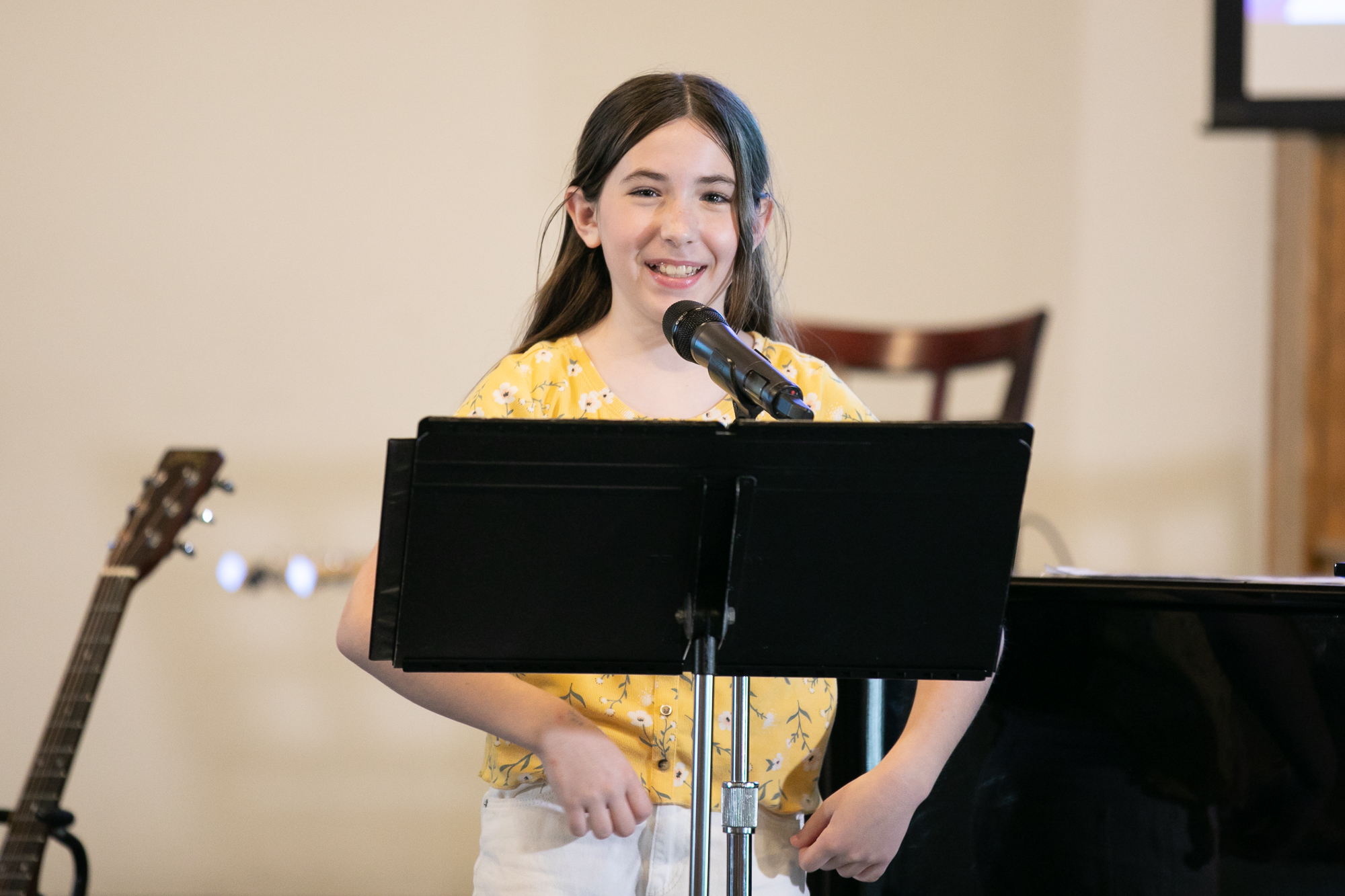 Student singing at a vocal recital